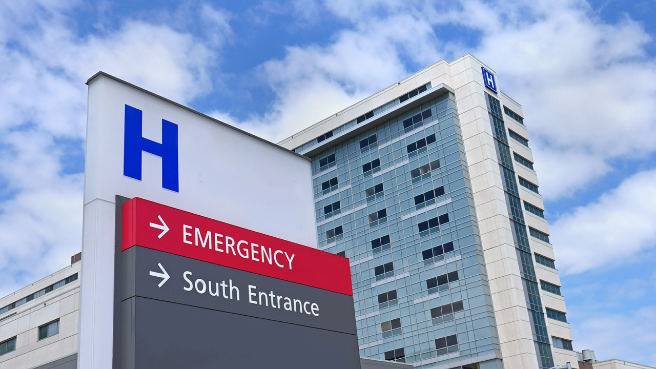 direction sign with capital letter H for hospital